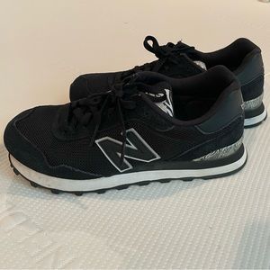 New Balance womens 6.5 black and white sneaker with zebra print. Great condition